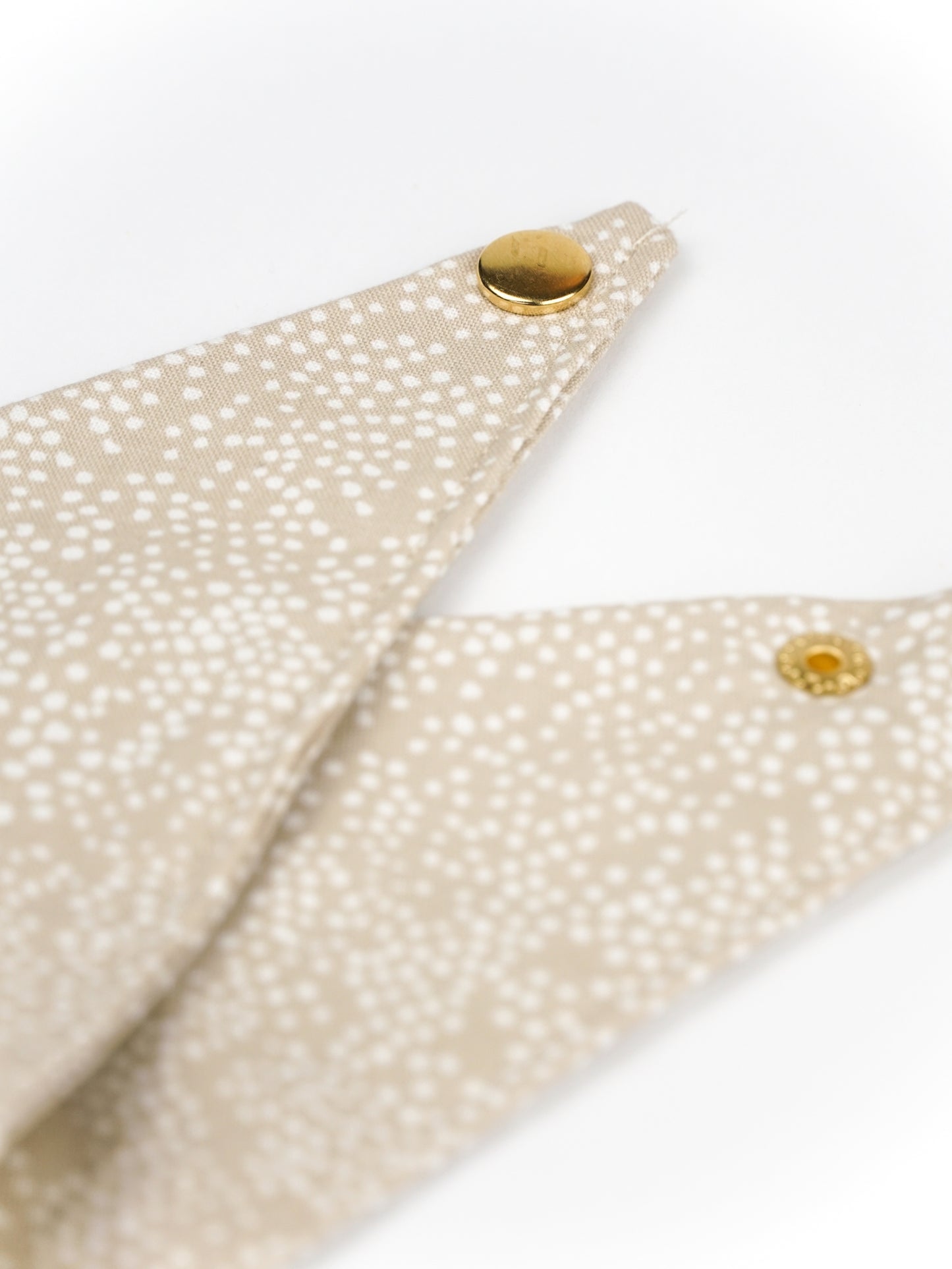 Pom & Chi Small Dog Bandana in Champagne Supernova closeup of gold hardware detail